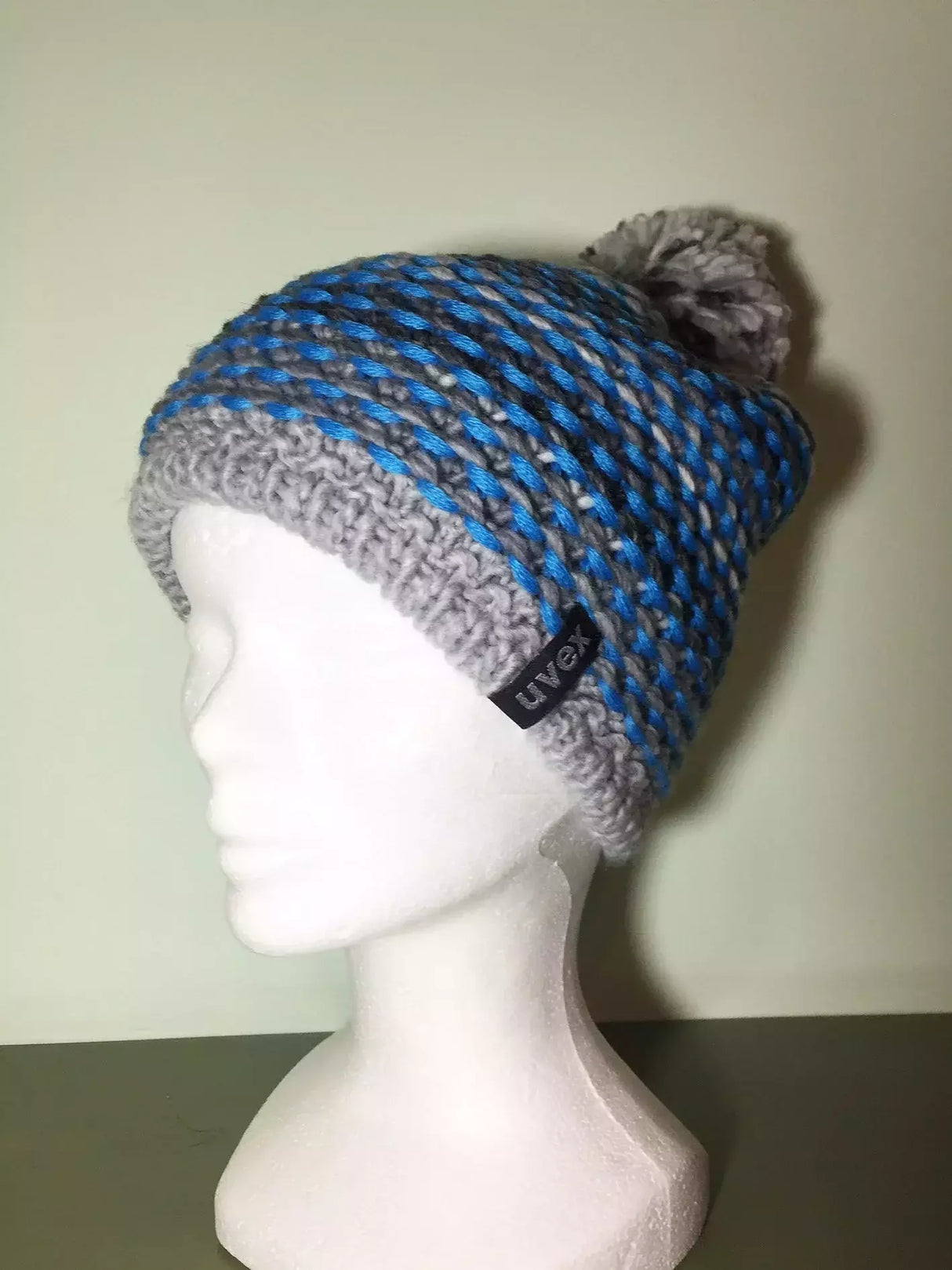 Cappello Lana Grigio Chiaro/scuro E Azzurro Con Pon Pon Interno In Pile Cod.uv18-7n190 Var 6 Uvex