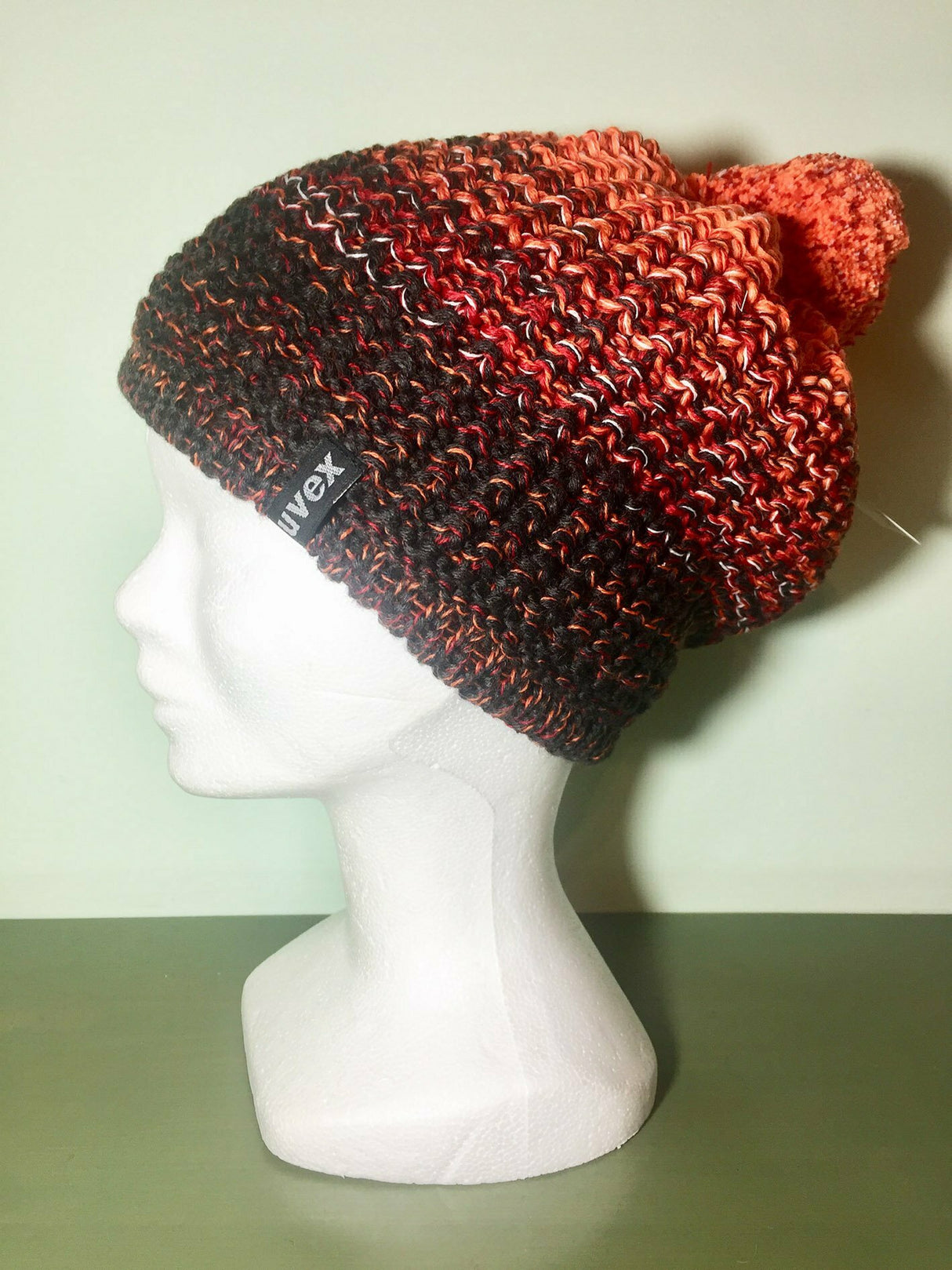 Cappello Lana Nero/arancio/rosso Con Pon Pon Interno In Pile Cod.uv18-7n199 Var 12 Uvex