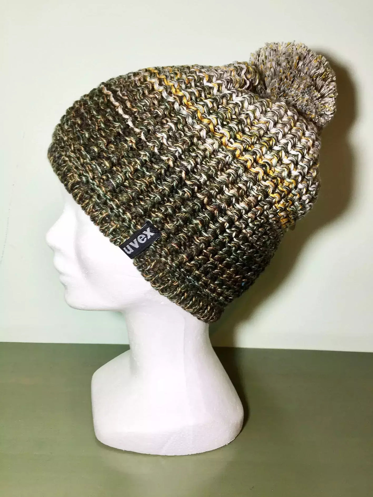 Cappello Lana Verde Scuro/grigio/giallo Con Pon Pon Interno In Pile Cod.uv18-7n199 Var 11 Uvex